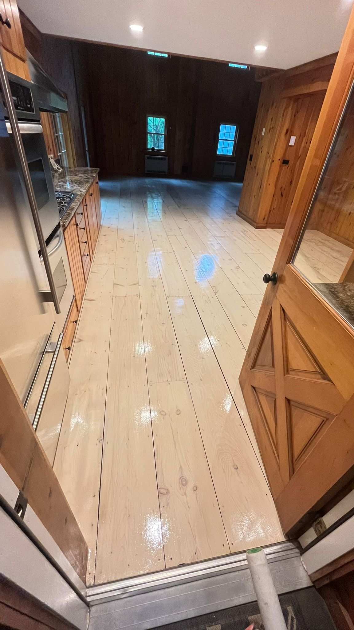 Hardwood floor installation and refinishing project 12