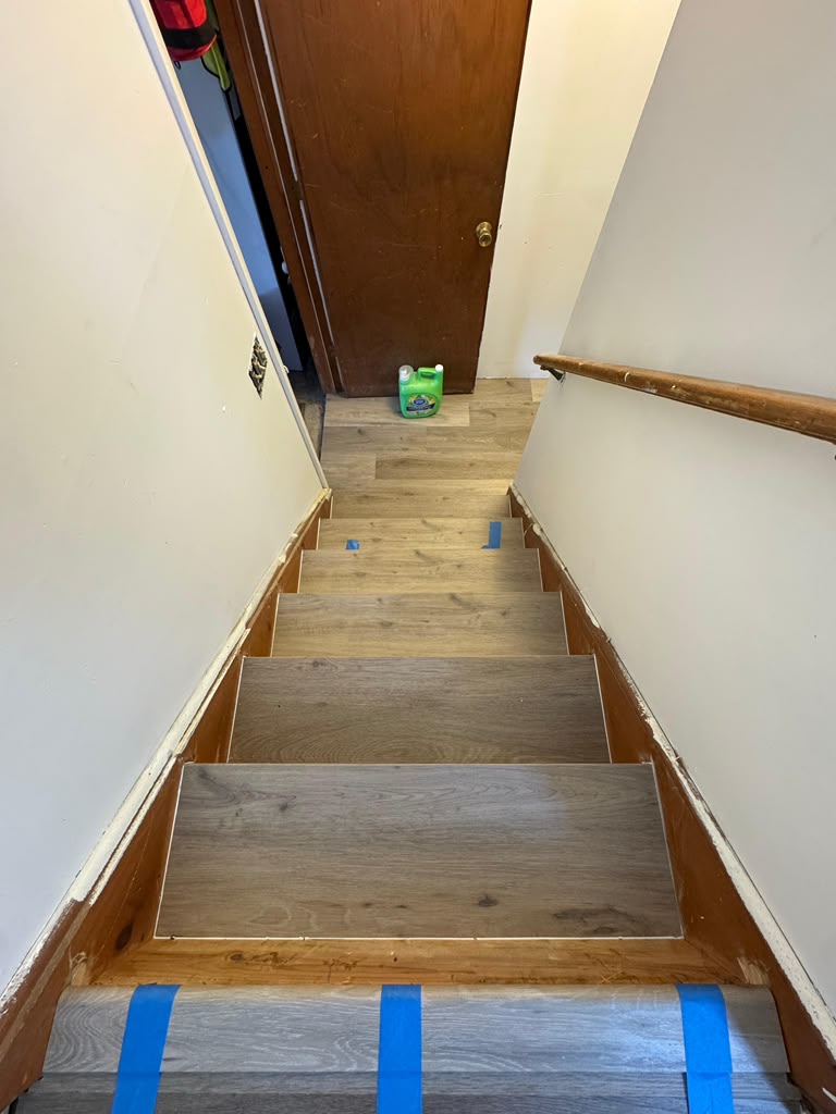 Laminate stair treads installed on a staircase
