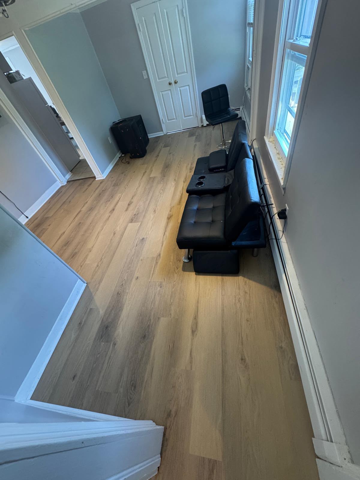 Light oak laminate flooring installed in a living room