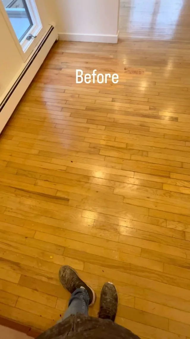 Worn amber floor before refinishing