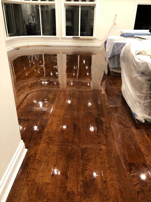 Dark walnut stain with a high-gloss finish